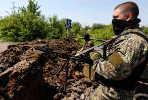 Pro Russian rebels man a position in eastern Ukraine